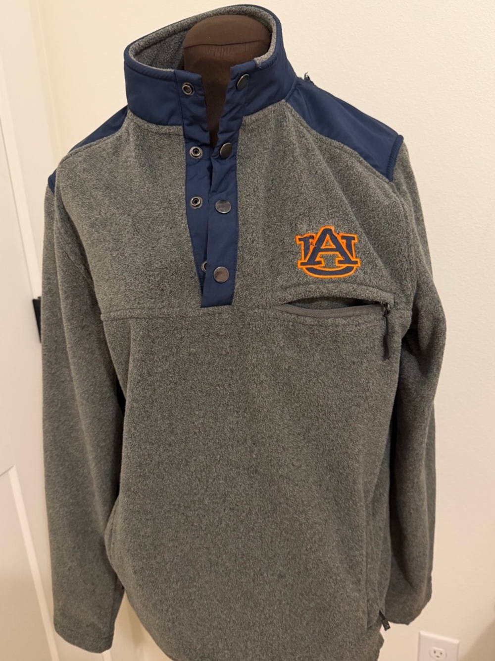 Men’s size Medium fleece AUBURN pullover.  Side zip and front chest zip pockets